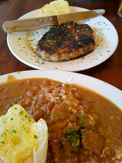 New Orleans Food & Spirits, with pork chop.