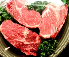 A textbook example of well-marbled ribeye beef steaks.