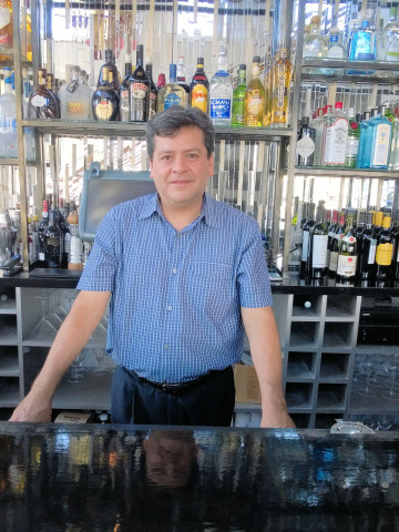 Danny Millan in the bar at Cava.