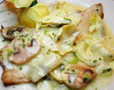Redfish with artichokes and mushrooms.