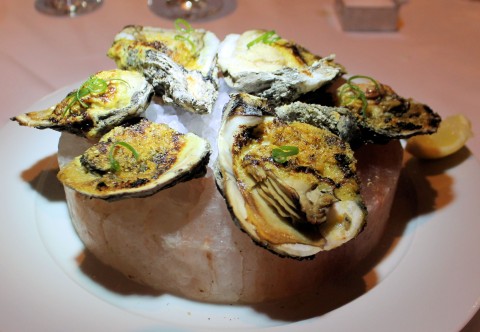 Oysters on a salt disk.