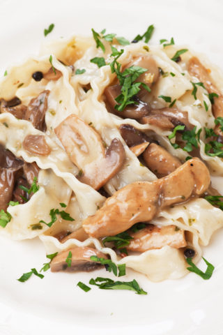 Pasta with wild mushrooms and chicken.
