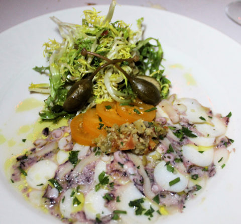Ceviche-style octopus, thinly sliced and sharp.