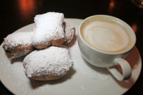 Beignets and cappuccino.
