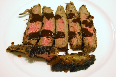 Flank steak, doused with Tabasco Caribbean-style steak sauce, from my kitchen.
