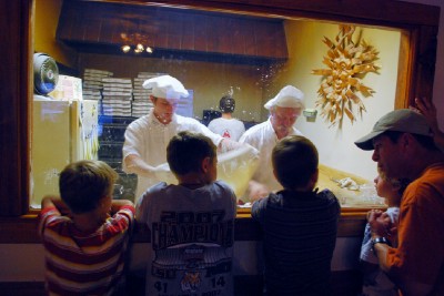 The current academy of children learning pizza from the Man himself.