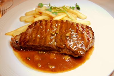 Sirloin strip steak in the Tsar's Palace dining room on the NCL Jewel.