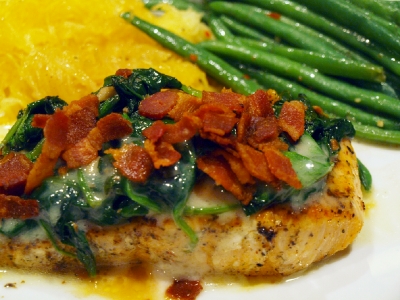 Grilled salmon with spinach and bacon.