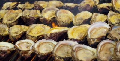 Oysters on the grill at the Acme.